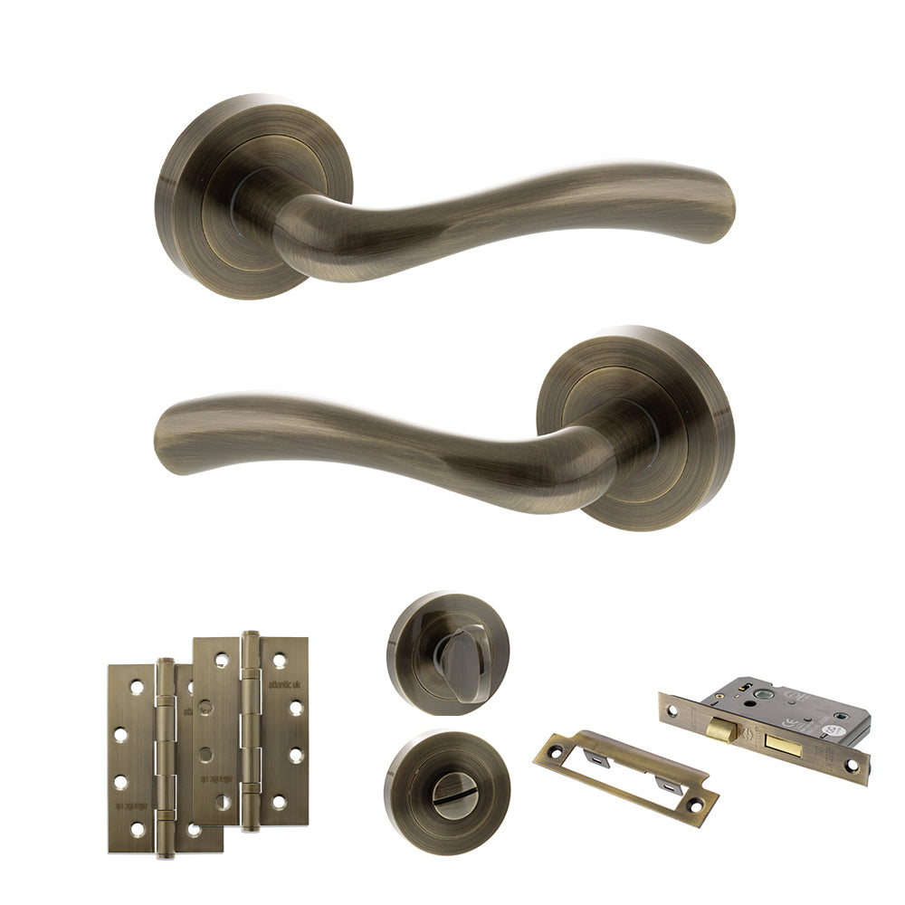 STATUS Texas Door Handle Pack (Bathroom Set - 2.5" CE Bathroom Lock, 4" Slim Knuckle Hinges x2) - Antique Brass