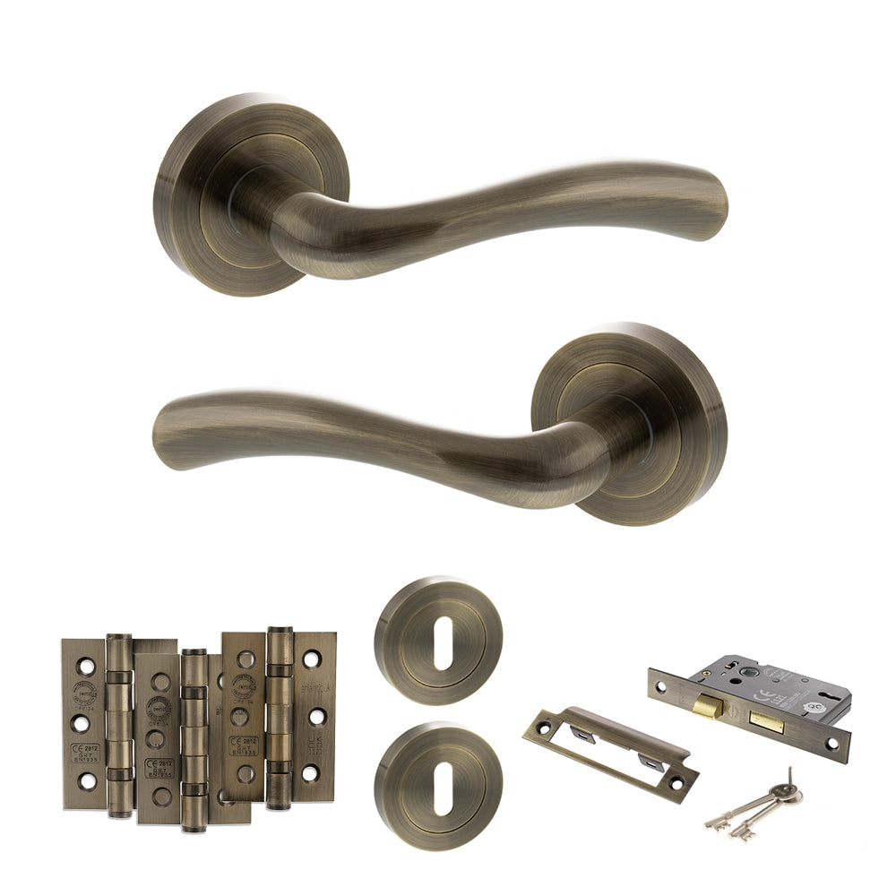 STATUS Texas Door Handle Pack (3 Lever Lock Set - 3" CE Sashlock, 3" Premium Hinges x3) - Antique Brass