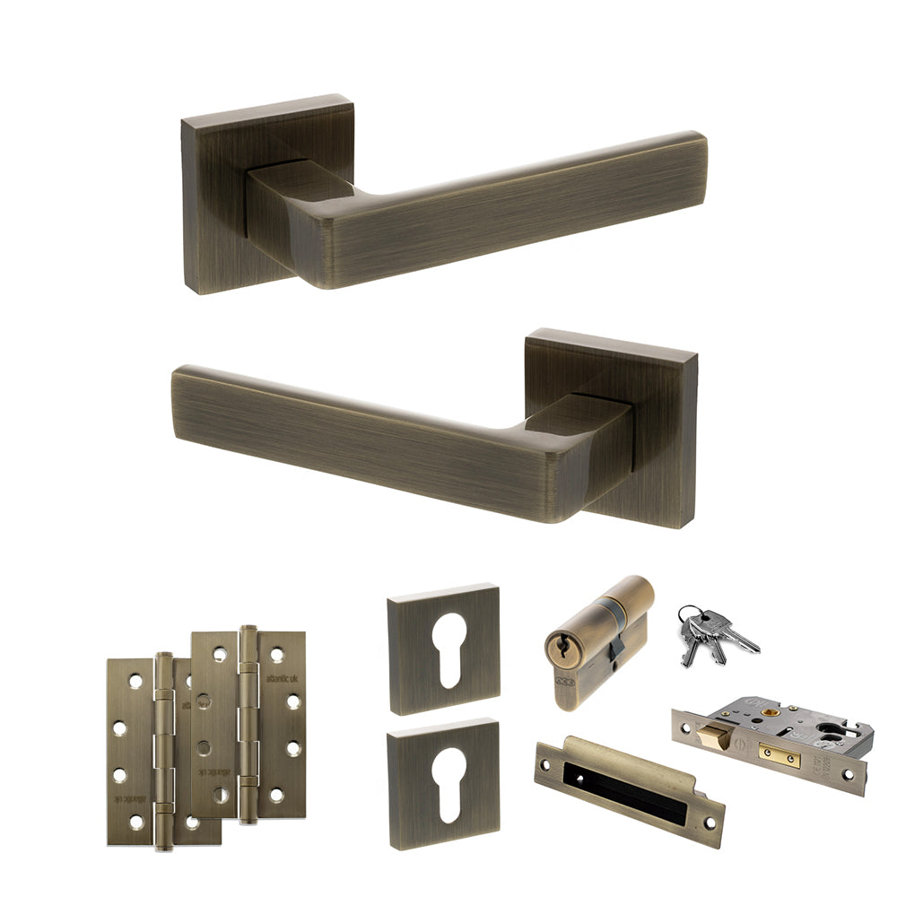 STATUS Montana Door Handle Pack (Euro Lock Set - 2.5" CE Sashlock, 4" Slim Knuckle Hinges x2) - Antique Brass