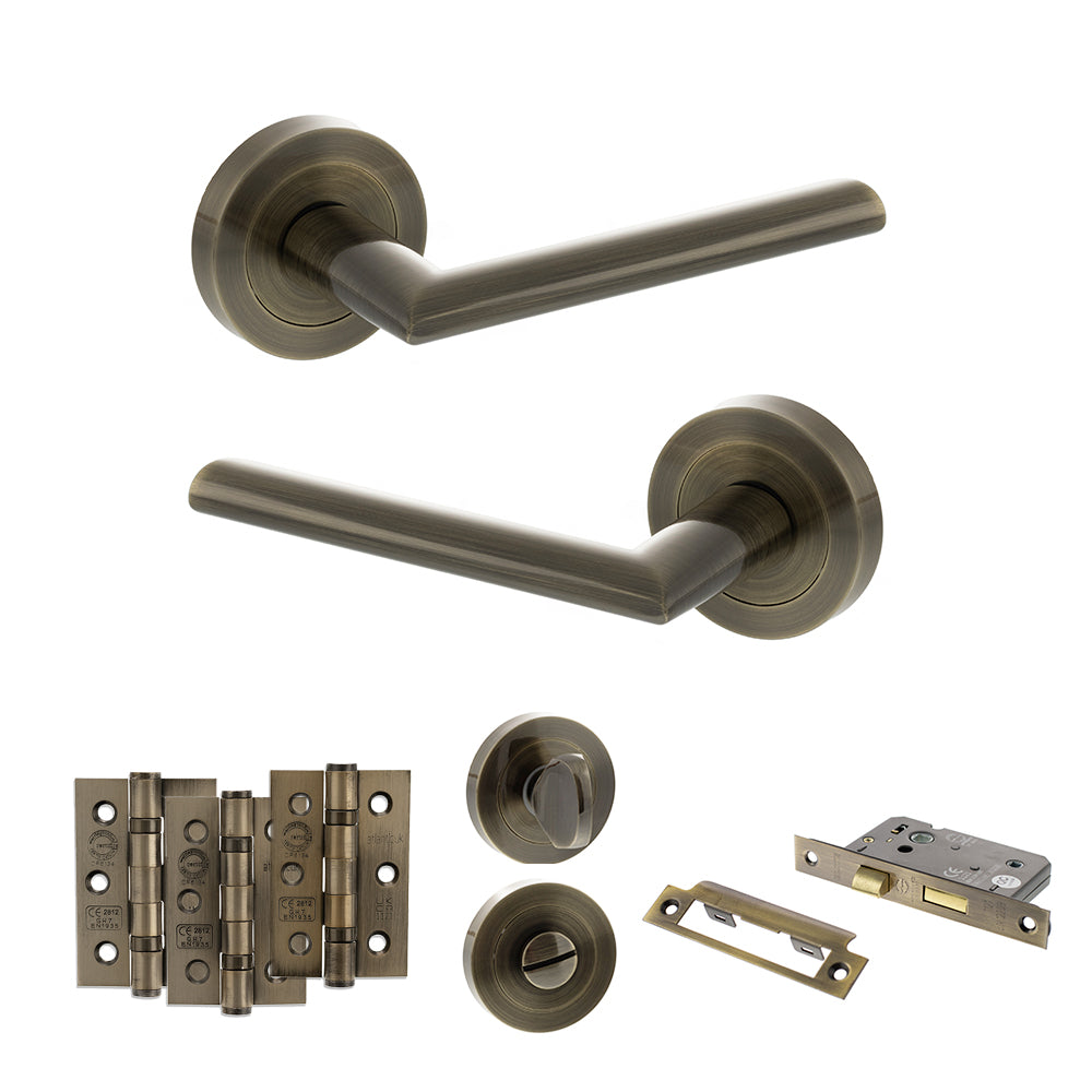 STATUS Alabama Door Handle Pack (Bathroom Set - 2.5" CE Bathroom Lock, 3" Premium Hinges x3) - Antique Brass
