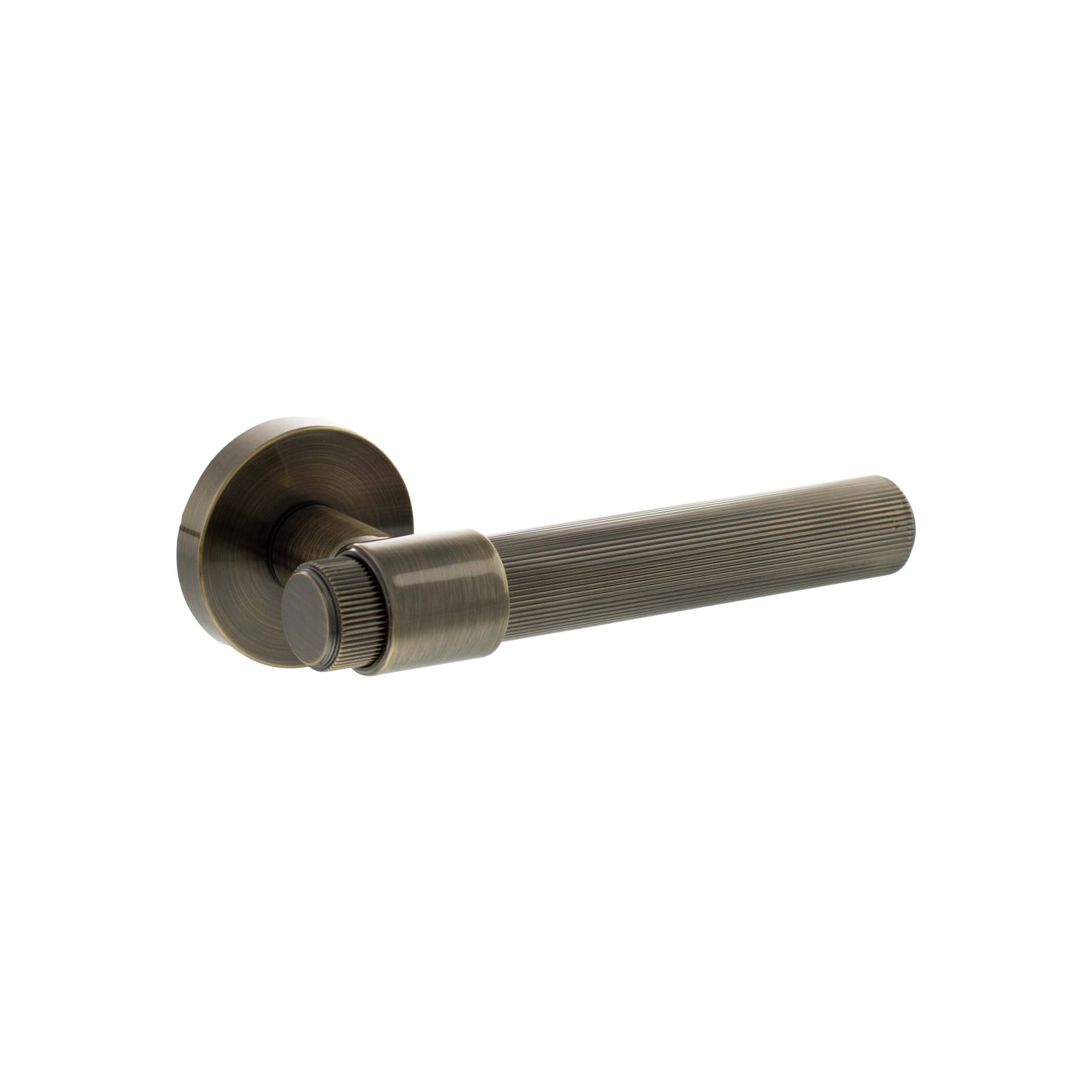 Atlantic Senza Pari Fasana Linear Knurled Lever Door Handle on Minimal Round Rose - Antique Brass