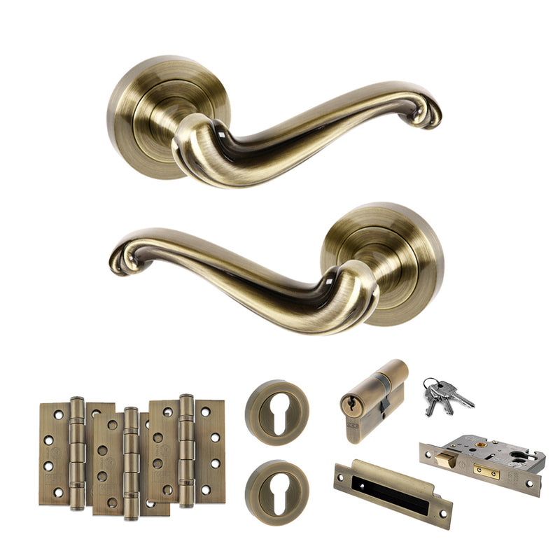 Old English Colchester Door Handle Pack (Euro Lock Set - 3" CE Sashlock, 4" Fire Rated Hinges x3) - Antique Brass
