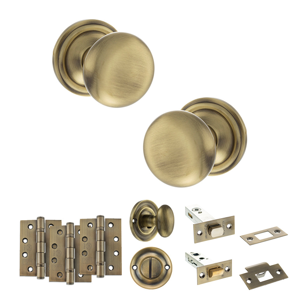 Old English Harrogate Door Knob Pack (Bathroom Set - 4" Deadbolt, 4" Fire Rated Hinges x3) - Antique Brass