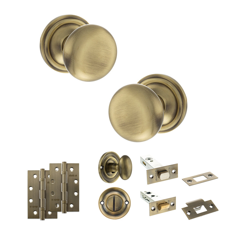 Old English Harrogate Door Knob Pack (Bathroom Set - 3" Deadbolt, 4" Slim Knuckle Hinges x2) - Antique Brass