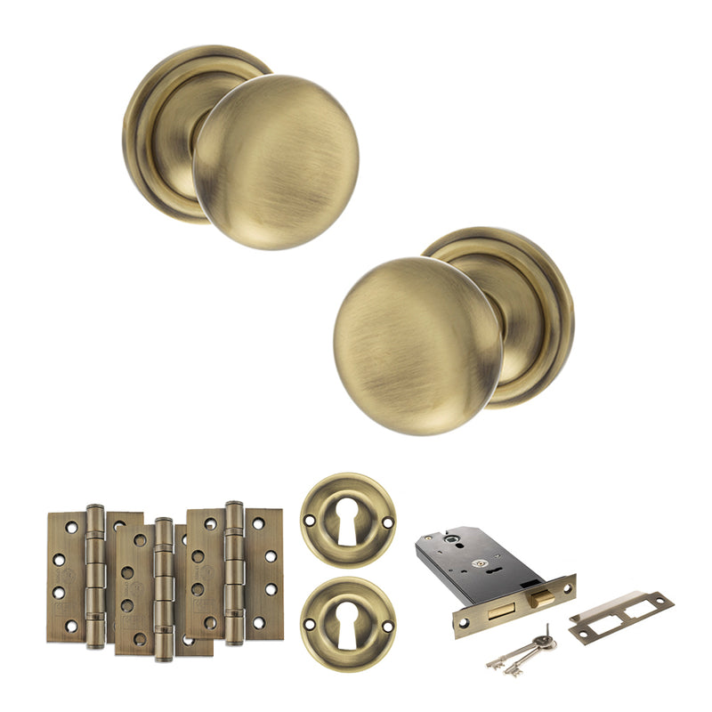 Old English Harrogate Door Knob Pack (Lock Set - Horizontal Sashlock, 4" Fire Rated Hinges x3) - Antique Brass