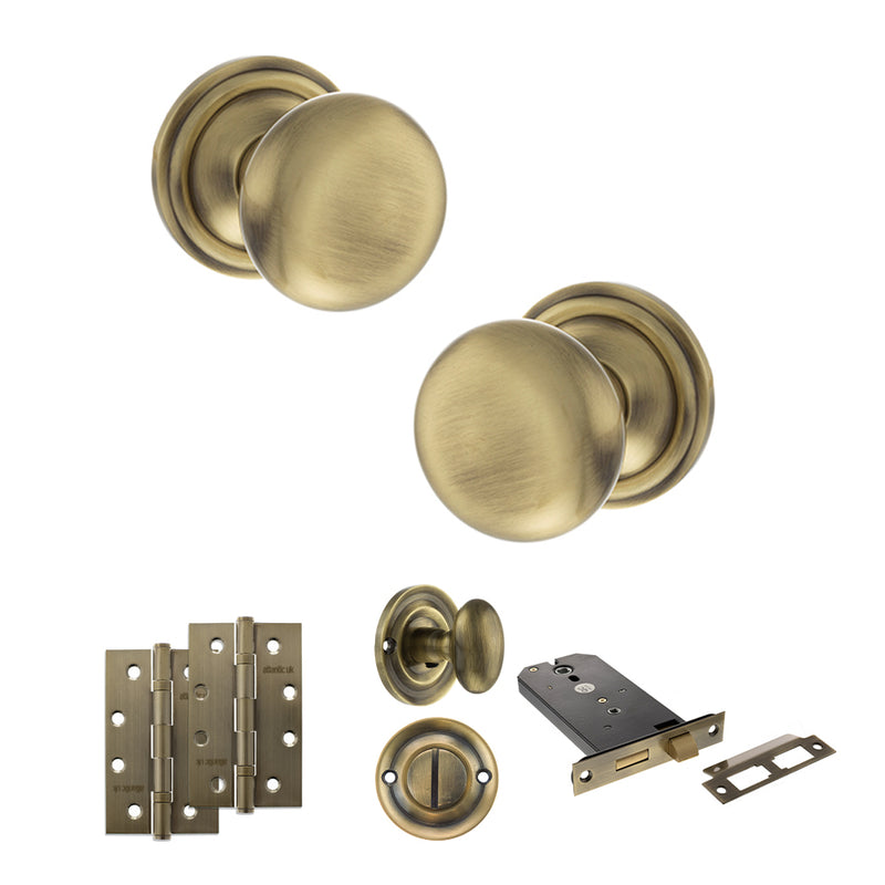 Old English Harrogate Door Knob Pack (Lock Set - Horizontal Bathlock, 4" Slim Knuckle Hinges x2) - Antique Brass