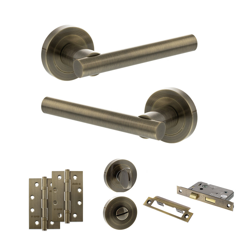 STATUS Nebraska Door Handle Pack (Bathroom Set - 2.5" CE Bathroom Lock, 4" Slim Knuckle Hinges x2) - Antique Brass