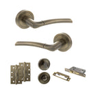 STATUS Indiana Door Handle Pack (Bathroom Set - 2.5" CE Bathroom Lock, 4" Slim Knuckle Hinges x2) - Antique Brass