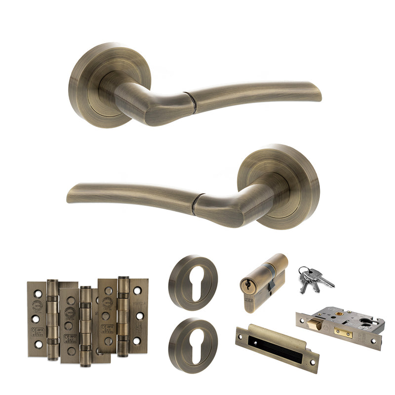 STATUS Indiana Door Handle Pack (Euro Lock Set - 2.5" CE Sashlock, 3" Fire Rated Hinges x3) - Antique Brass