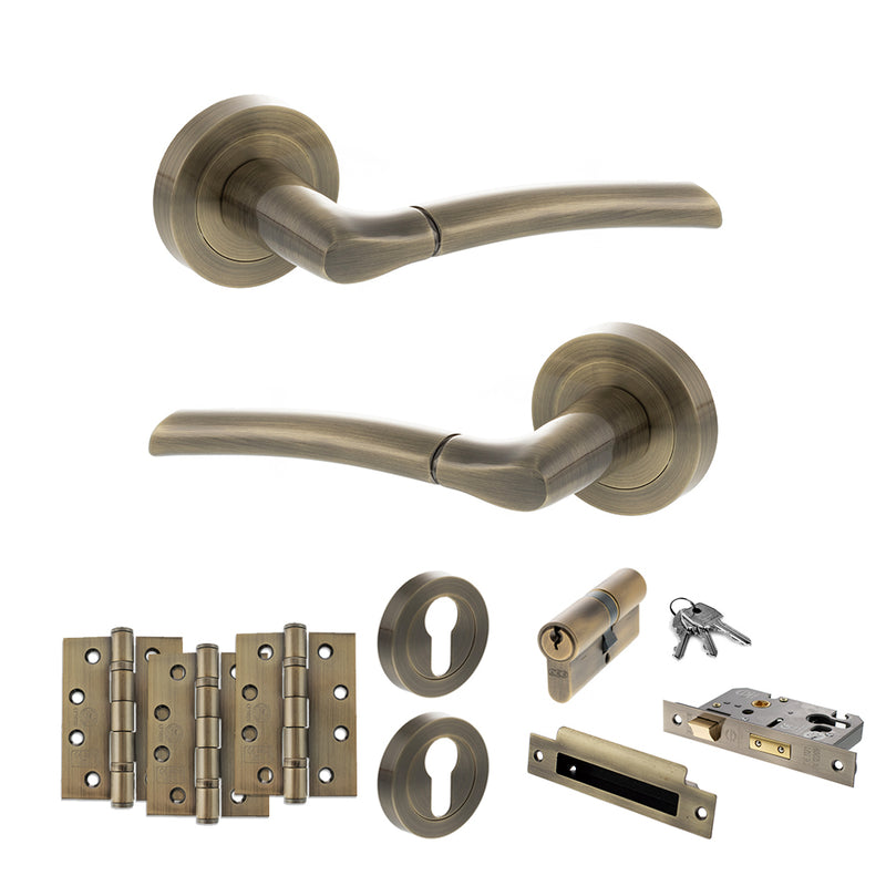 STATUS Indiana Door Handle Pack (Euro Lock Set - 2.5" CE Sashlock, 4" Fire Rated Hinges x3) - Antique Brass