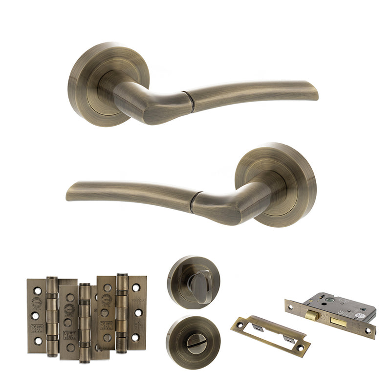 STATUS Indiana Door Handle Pack (Bathroom Set - 2.5" CE Bathroom Lock, 3" Premium Hinges x3) - Antique Brass