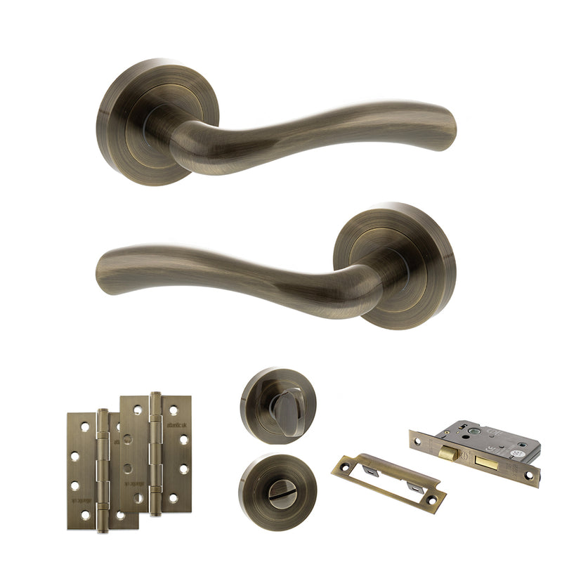 STATUS Texas Door Handle Pack (Bathroom Set - 3" CE Bathroom Lock, 4" Slim Knuckle Hinges x2) - Antique Brass