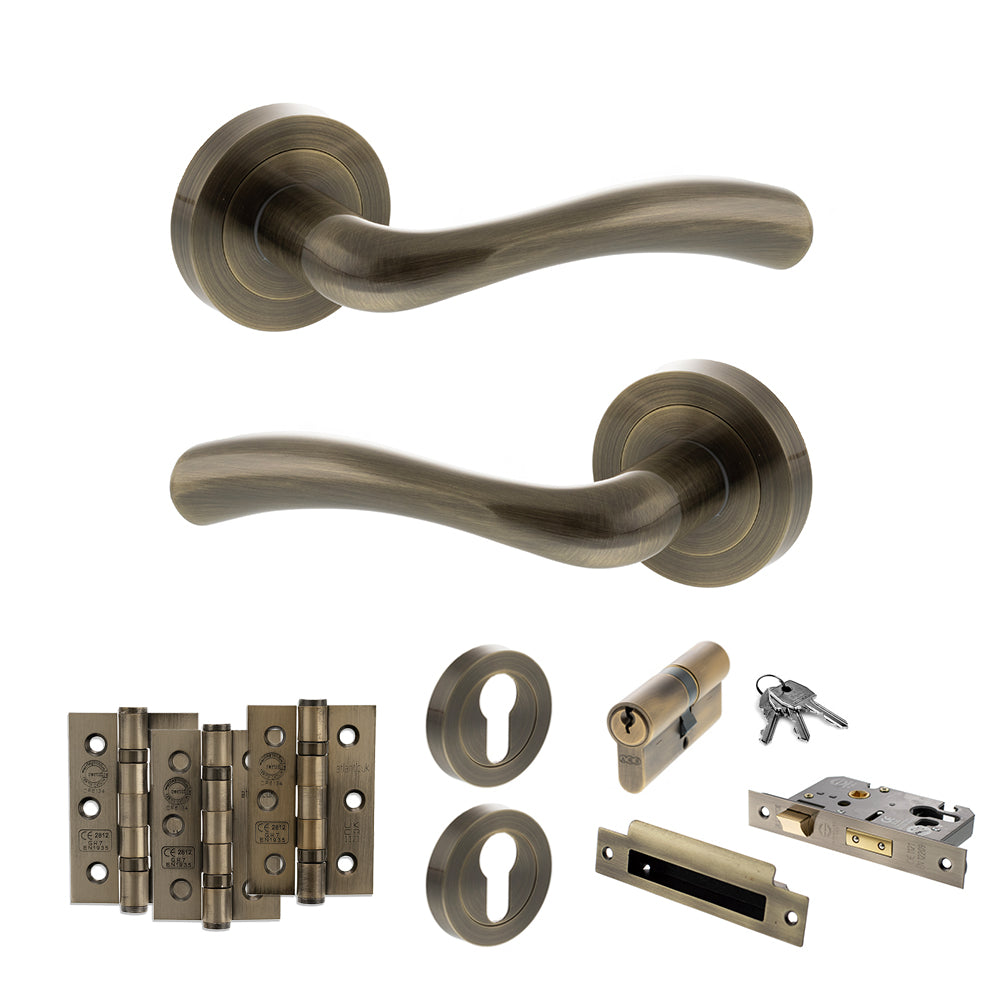 STATUS Texas Door Handle Pack (Euro Lock Set - 2.5" CE Sashlock, 3" Premium Hinges x3) - Antique Brass