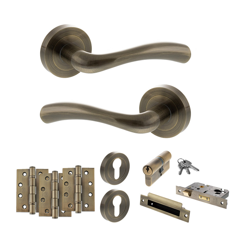 STATUS Texas Door Handle Pack (Euro Lock Set - 3" CE Sashlock, 4" Fire Rated Hinges x3) - Antique Brass