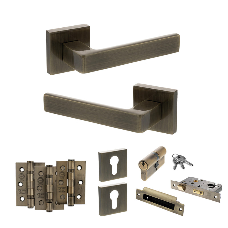 STATUS Montana Door Handle Pack (Euro Lock Set - 2.5" CE Sashlock, 3" Fire Rated Hinges x3) - Antique Brass