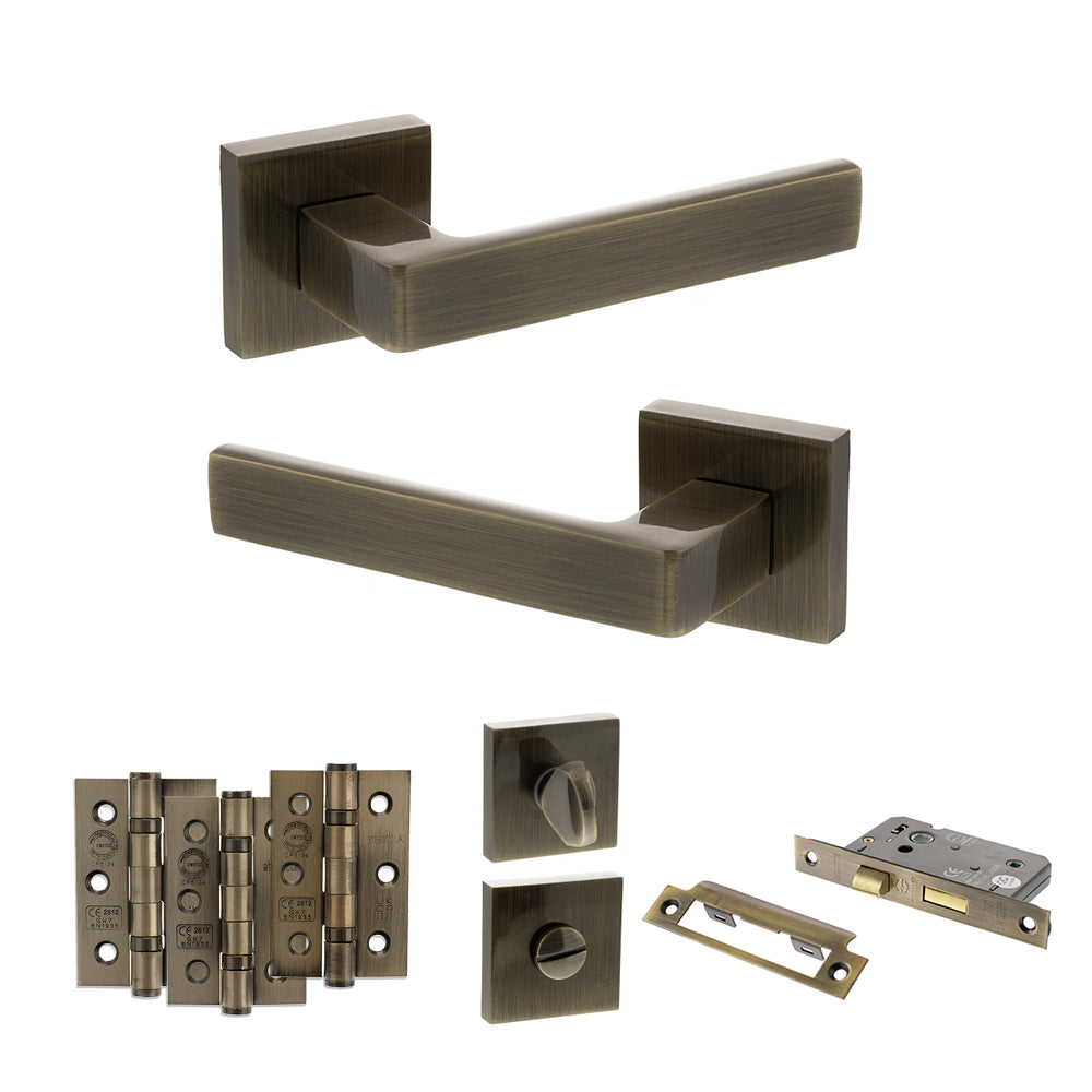 STATUS Montana Door Handle Pack (Bathroom Set - 2.5" CE Bathroom Lock, 3" Premium Hinges x3) - Antique Brass