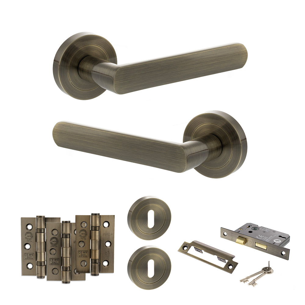 STATUS Carolina Door Handle Pack (3 Lever Lock Set - 2.5" CE Sashlock, 3" Premium Hinges x3) - Antique Brass