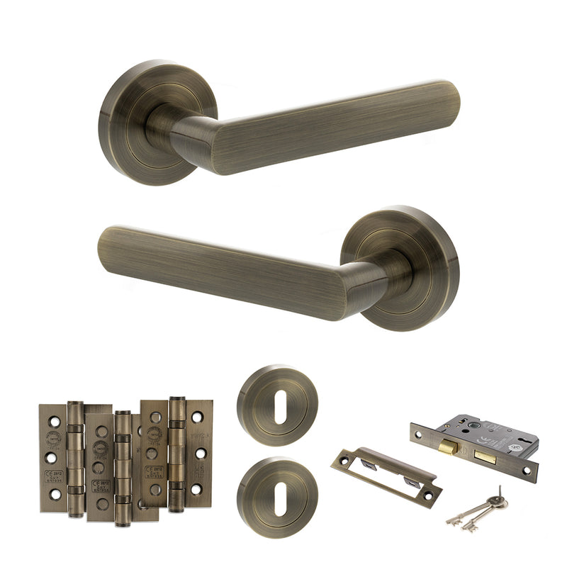 STATUS Carolina Door Handle Pack (3 Lever Lock Set - 2.5" CE Sashlock, 3" Premium Hinges x3) - Antique Brass