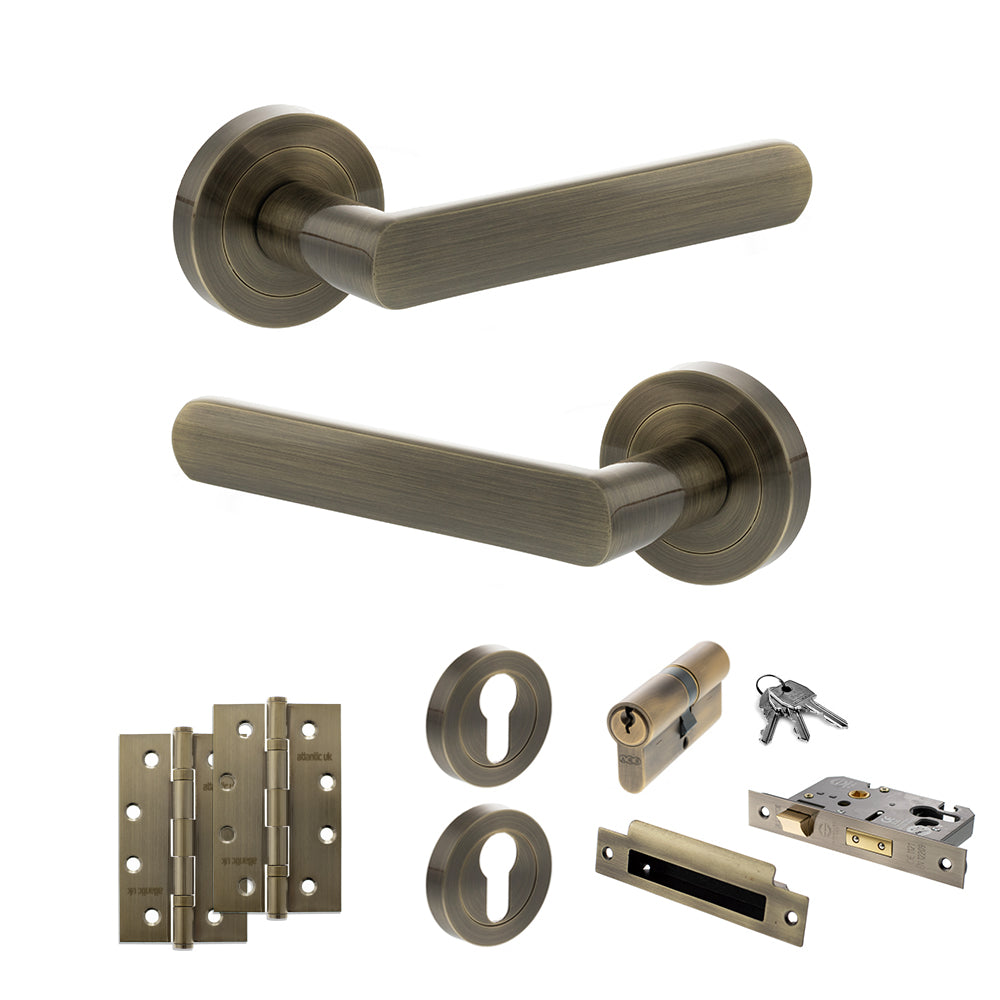 STATUS Carolina Door Handle Pack (Euro Lock Set - 2.5" CE Sashlock, 4" Slim Knuckle Hinges x2) - Antique Brass