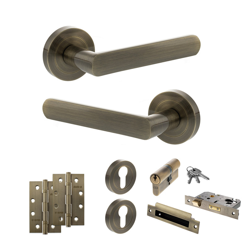 STATUS Carolina Door Handle Pack (Euro Lock Set - 2.5" CE Sashlock, 4" Slim Knuckle Hinges x2) - Antique Brass