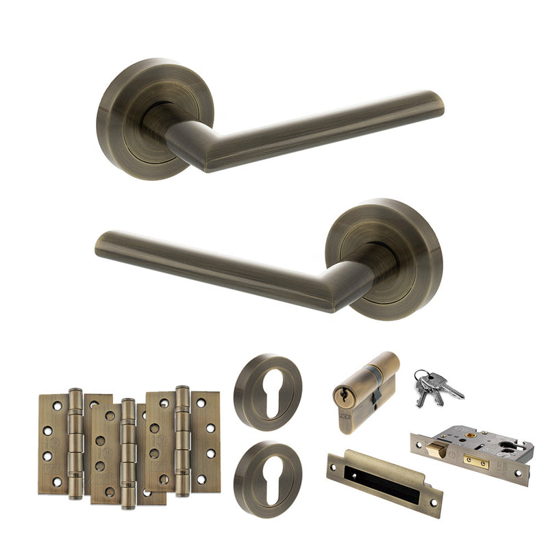 STATUS Alabama Door Handle Pack (Euro Lock Set - 2.5" CE Sashlock, 4" Fire Rated Hinges x3) - Antique Brass